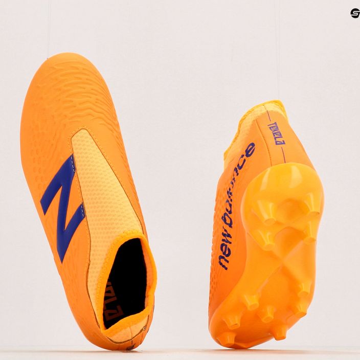 Παιδικά ποδοσφαιρικά παπούτσια New Balance Tekela V3+ Magique FG πορτοκαλί JST3FD35.M.045 10