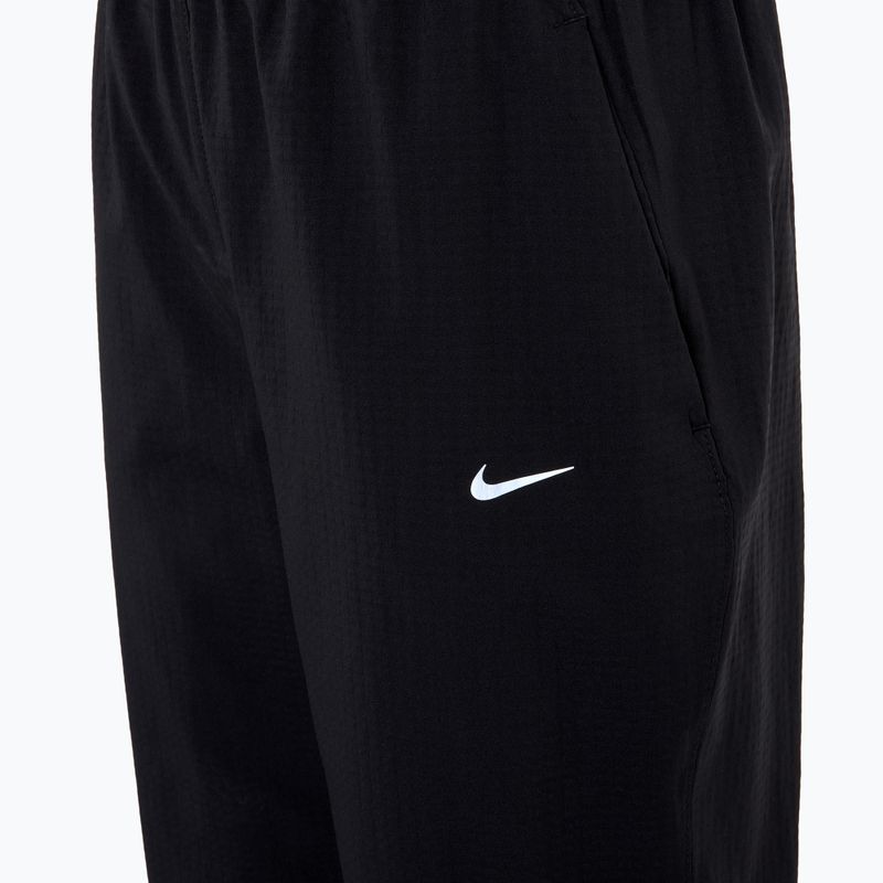 Γυναικείο παντελόνι τρεξίματος Nike Dri-Fit Fast Mid-Rise 7/8 μαύρο 3